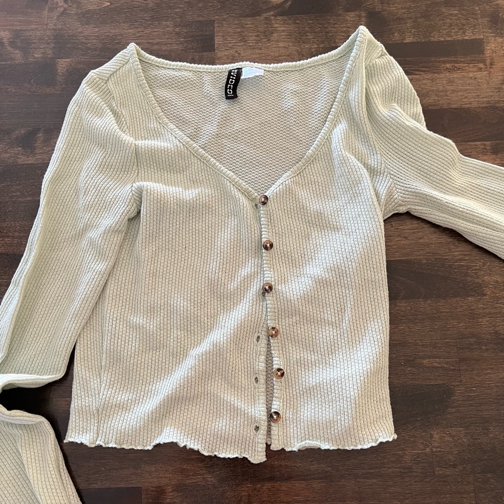 Divided long sleeve button up top